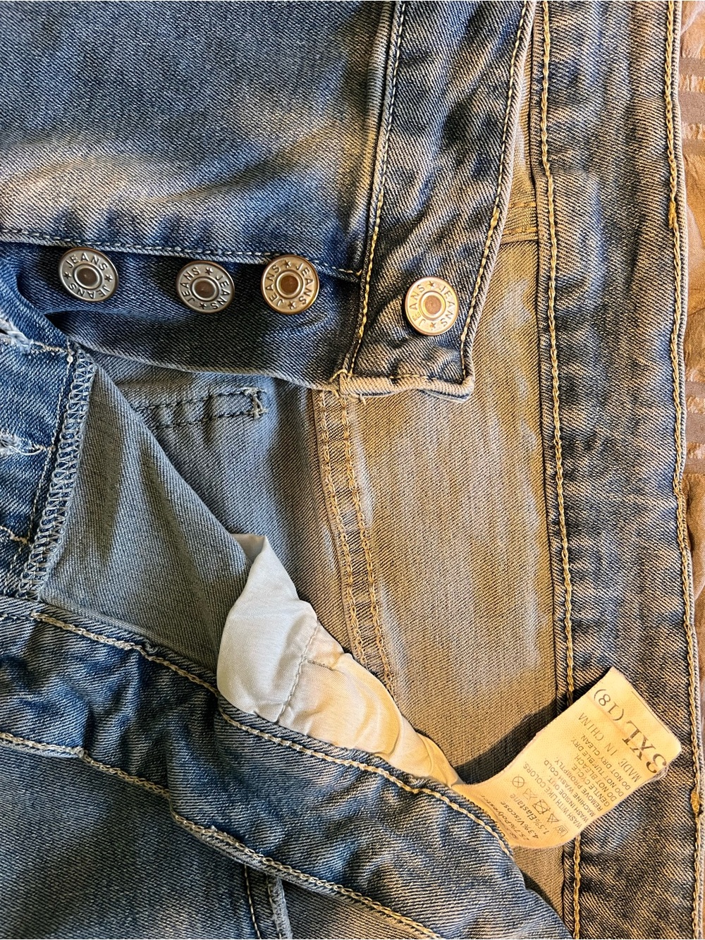 Classic Blue Women’s Denim Bermuda shorts with button fly.